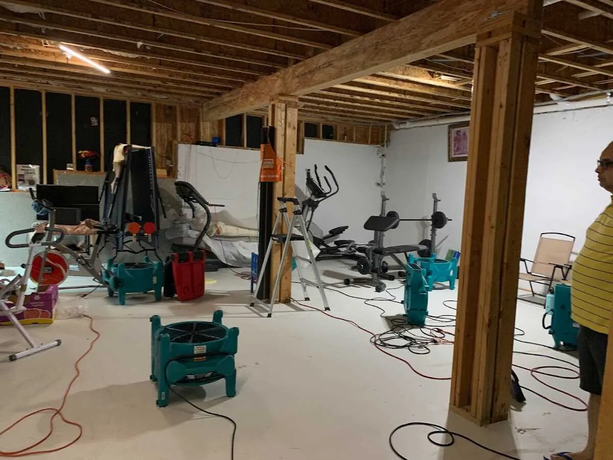 Basement drying equipment setup for Contents Cleaning & Restoration in Plattsmouth